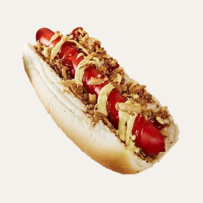 Le nomade Dog - Traiteur Événementiel Nantes & Vitré | Restonomade Hot-dog avec saucisse, oignons frits, ketchup et moutarde.