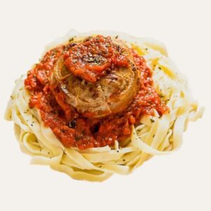 Le Veau de Sienne - Traiteur Événementiel Nantes & Vitré | Restonomade Paupiette de veau à l'italienne servie sur des tagliatelles avec sauce tomate