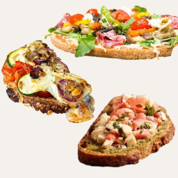 Assortiment de bruschetta pour traiteur à Nantes : la gamme "Les Escales Croustillantes" de Restonomade, idéale pour un cocktail dînatoire ou un buffet.